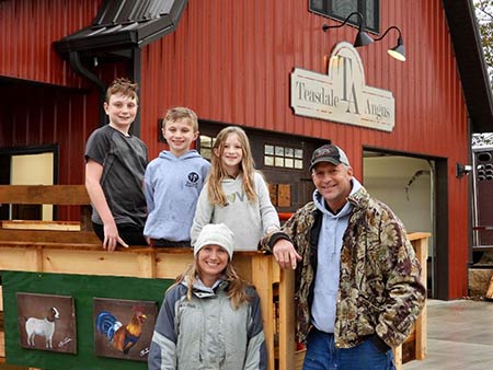 Teasdale Family in front of Barn